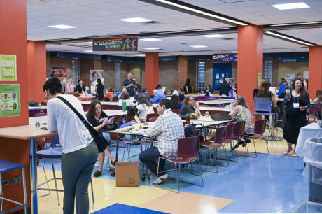 people in cafeteria enjoying break time