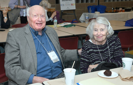 older man and woman smiling