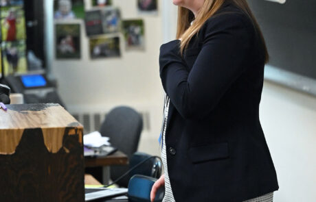 woman in business jacket speaking